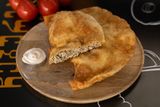 Cheburek with pork and beef.