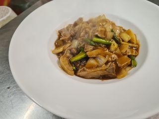 Pato Con Salsa De Curry Rojo