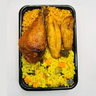 A Plate Of Rice With Chicken