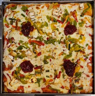 Pizza Caprese (1 Porción)