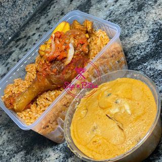 Jollof rice and moimoi with chicken 