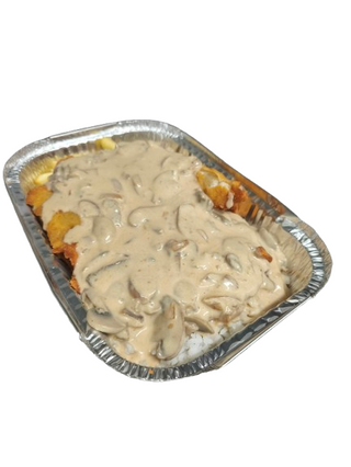 Pechuga Empanada En Salsa Champiñones