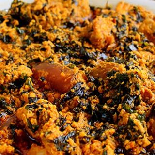 Egusi mixed with shaki and chicken 