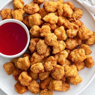 68. Ración De Popcorn De Pollo