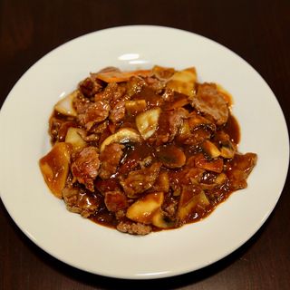 T7 - Ternera con salsa de ostras