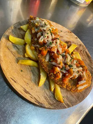 Milanesa de ternera con salsa de boletus y queso curado trufado