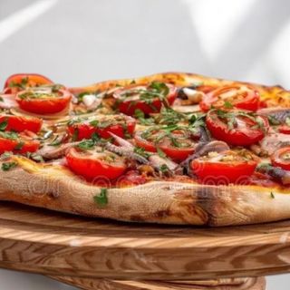 Pane All’aglio con tomate y anchoas