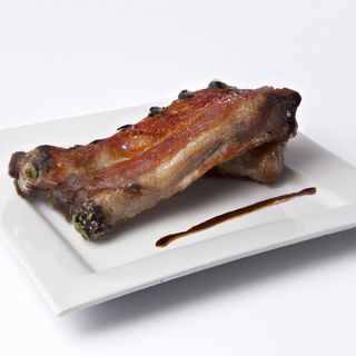 Costilla De Cerdo Asada Con Guarnición