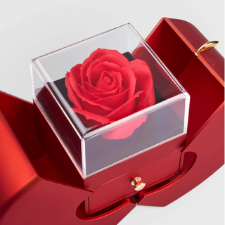 Rosa en caja de manzana