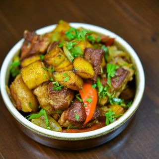 ოჯახური ღორის ხორცით 100 გრ