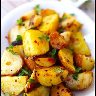 GARLIC POTATOES( Served with sweetened kachumbari)
