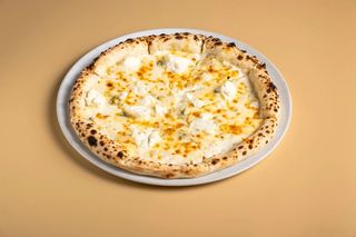 Пицца четыре сыра