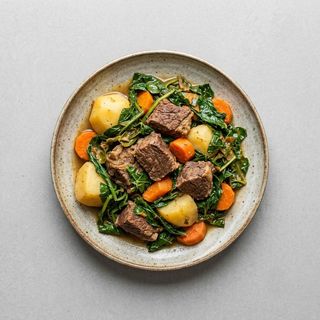 Beef Tumbukiza  with greens