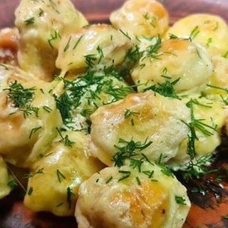 Пельмешки смажені та протушковані у вершках та сиром