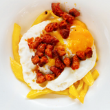 Huevos rotos con chistorra