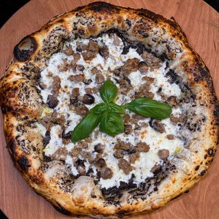 Tartufo nero con salsiccia e porcini 