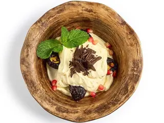 Чорнослив з горіхами та вершковим соусом (200g)