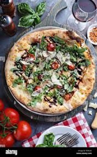 Rucola, scaglie di grana, pachino e aceto balsamico