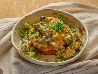 Деруни з чорноморськими рапанами та грибами (300г)