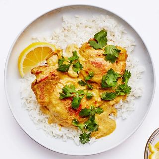 Fish whole in Groundnut Sauce/ Rice & greens