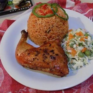 Jollof Rice + Salad and chicken