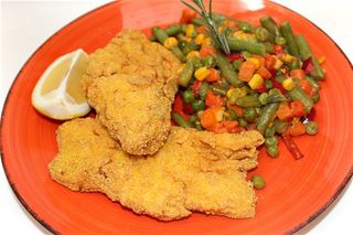 Merluciu in crusta de malai cu legume mexican