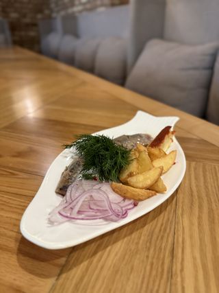 Оселедець з картоплею (200/100г)