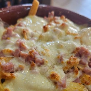Patatas al Roquefort (1/2 porción)