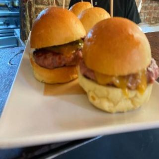 mini burger, brioche, cheddar and pickle sauce
