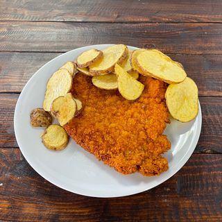 COTOLETTA DI MAIALE DA CIRCA 300 GR .CON UN CONTORNO E BIBITA