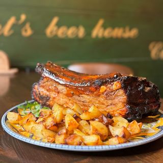 Ribs di maiale homemade con patate al forno