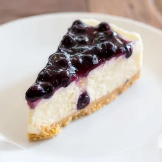 Tarta De Queso Con Arándanos (Ración)