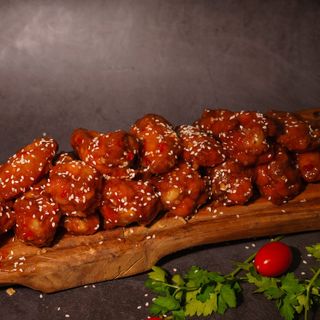 Крылышки в кисло-сладком соусе 30шт