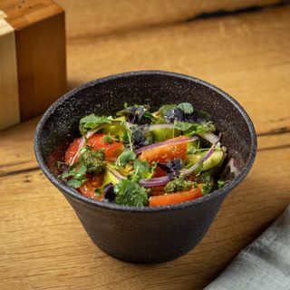 Salad with fresh vegetables and walnuts