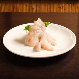 104.  Sashimi Branzino - 8 pezzi