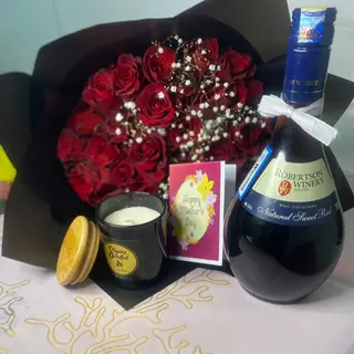 Mom's Blissful Retreat: Flowers, Wine, Candle, and Love