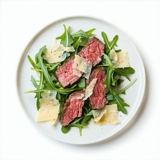 Tagliata di bovino rucola e grana