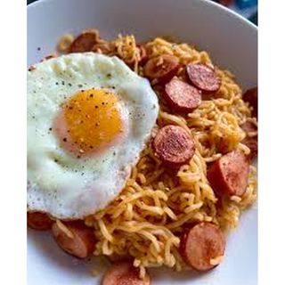 Noodles, Fried Egg,. Fish And Hotdog