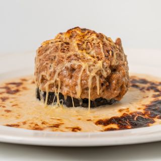 Berenjena Rellenada De Carne Gratinada con bechamel 