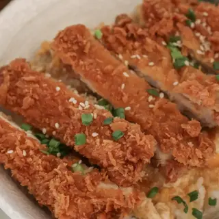 Arroz Frito Con Filete De Pollo
Rebozado  