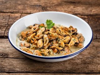 М'ясо мідій в часниковому соусі (200g)