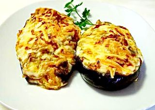 Berengena rellena de carne (1/2 ración)