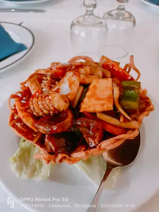 91, Mariscos Salteados En Nido De Golondrina