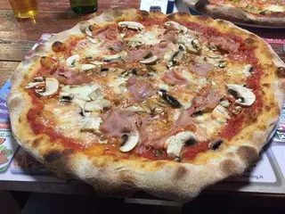 Prosciutto e funghi