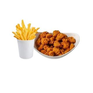 Bolas de pollo frito con patatas fritas