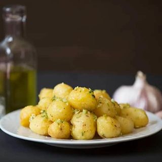 Ración de papas asadero