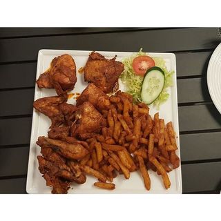 Chicken Poussin served with Fries