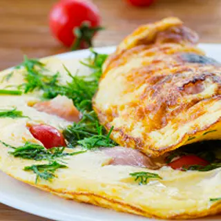 Omelette tomate herbe