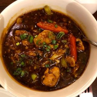 Pollo a la pimienta negra