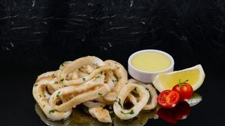 Калмари на плоча (200г)